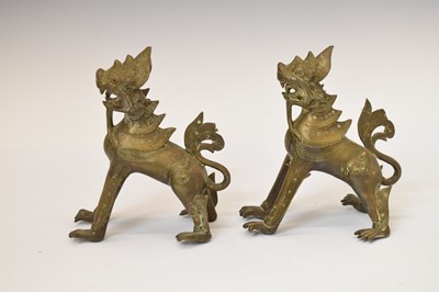 Lot 454 - Pair of antique Burmese bronze 'Chinthe' or temple lions