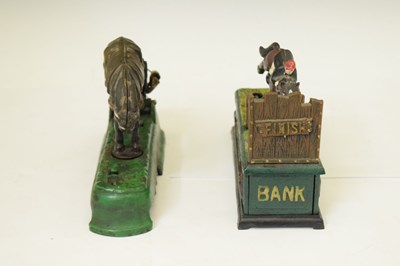 Lot 317 - Two reproduction cast iron money boxes