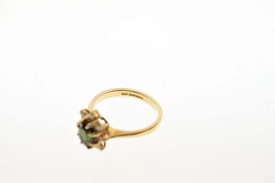 Lot 20 - 18ct gold dress ring set a faceted green stone