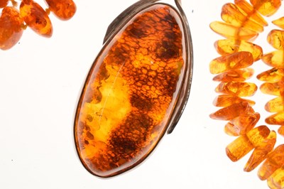 Lot 75 - Two amber bead necklaces