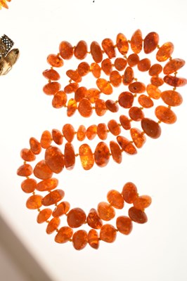 Lot 75 - Two amber bead necklaces