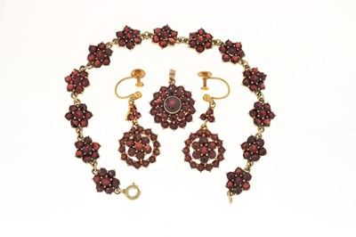 Lot 61 - Near matching suite of garnet set jewellery