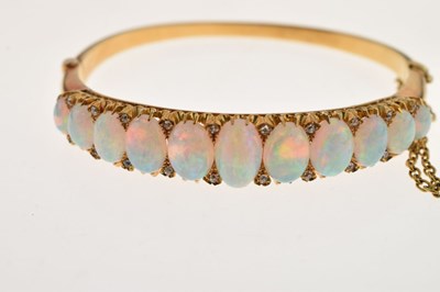Lot 46 - Edwardian opal and diamond hinged bangle
