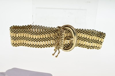 Lot 87 - Gold adjustable buckle-design bracelet