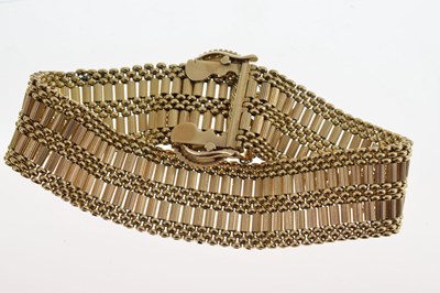 Lot 87 - Gold adjustable buckle-design bracelet
