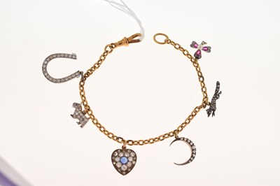 Lot 93 - Charm bracelet, attached six various diamond set charms
