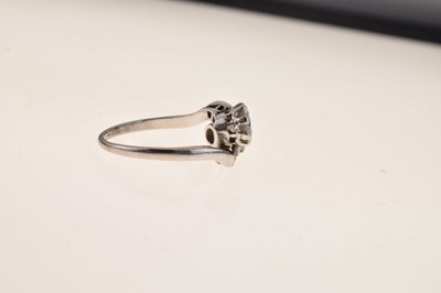 Lot 114 - Two-stone diamond crossover ring