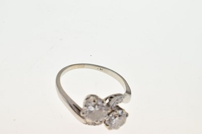 Lot 114 - Two-stone diamond crossover ring