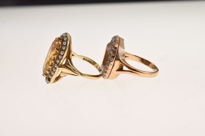Lot 29 - Two citrine and seed pearl rings
