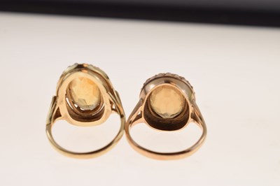 Lot 29 - Two citrine and seed pearl rings