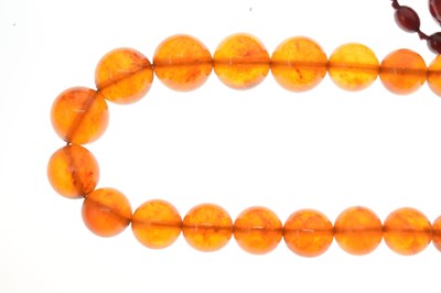 Lot 63 - 'Cherry amber' and Russian amber necklaces