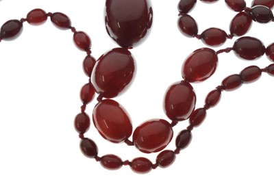 Lot 63 - 'Cherry amber' and Russian amber necklaces