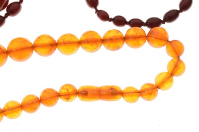 Lot 63 - 'Cherry amber' and Russian amber necklaces