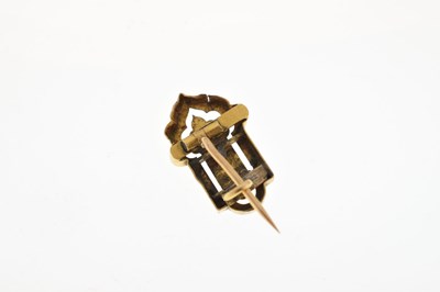 Lot 48 - Unmarked yellow metal brooch set three rose cut diamonds