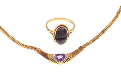 Lot 63 - 9ct gold necklace set heart-shaped amethyst-coloured stone