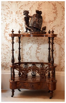 Lot 579 - Victorian figured walnut Canterbury whatnot