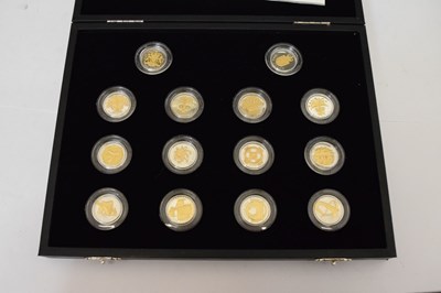 Lot 156 - Royal Mint silver proof with gold highlights '25th Anniversary of The £1 Coin' 14 coin set