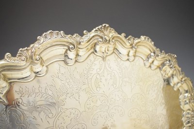 Lot 105 - Edward VII silver oval tray with scroll and shell moulded handles