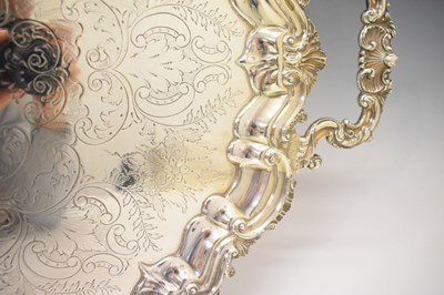 Lot 105 - Edward VII silver oval tray with scroll and shell moulded handles