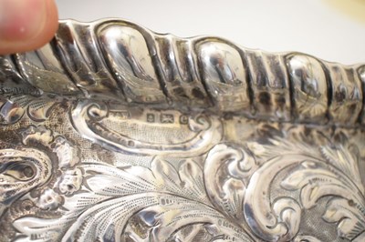 Lot 104 - Edward VII silver rectangular tray with all-over embossed rococo decoration