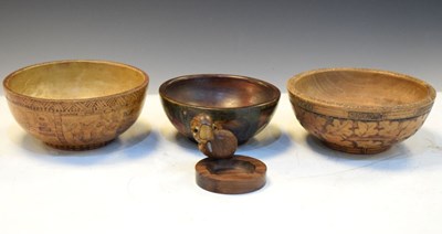 Lot 212 - Three wooden bowls and ashtray