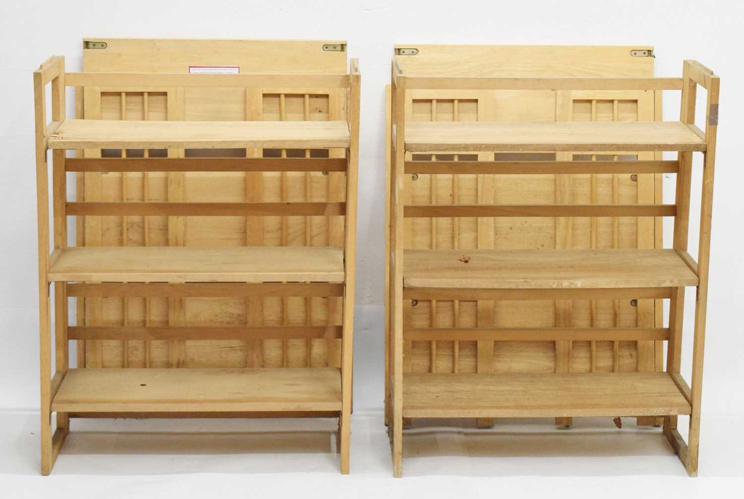 Lot 630 - Four folding wooden display shelves