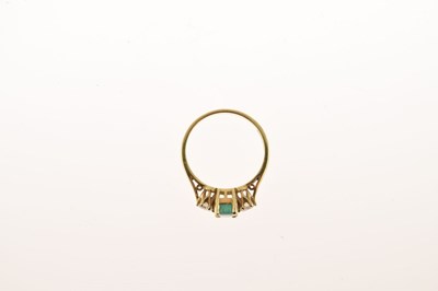 Lot 14 - 18ct gold emerald and diamond three-stone ring