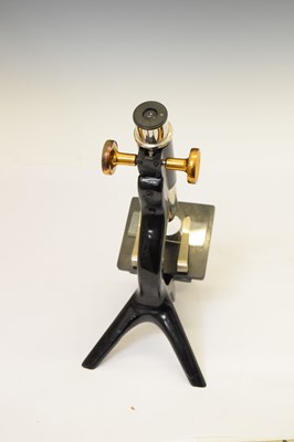 Lot 397 - W&S tripod table top microscope