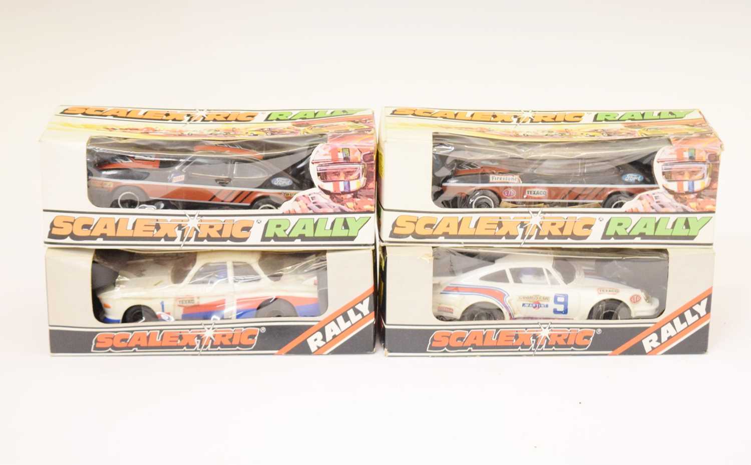 Lot 311 Scalextric Rally Four boxed slot cars