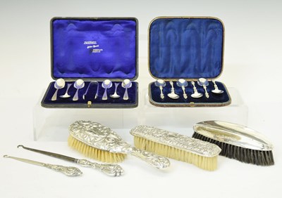 Lot 107 - Two cased sets of silver teaspoons, and a quantity silver backed dressing table items