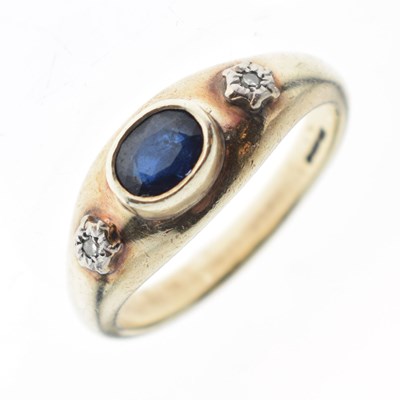 Lot 13 - Gentleman's 9ct gold ring set oval cut sapphire and two illusion-set diamonds