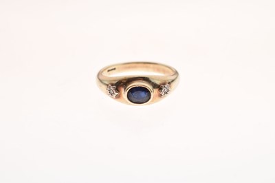 Lot 13 - Gentleman's 9ct gold ring set oval cut sapphire and two illusion-set diamonds