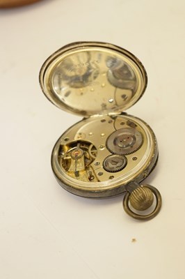 Lot 89 - Two silver open face pocket watches and holders