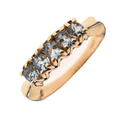 Lot 22 - 9ct gold dress ring set five oval blue topaz coloured stones