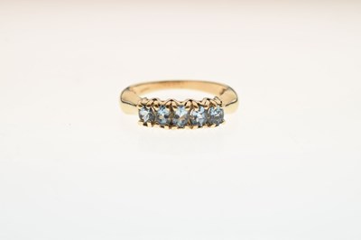 Lot 22 - 9ct gold dress ring set five oval blue topaz coloured stones