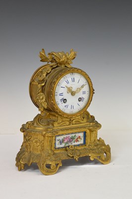 Lot 585 - French bronze and porcelain clock - Rollin