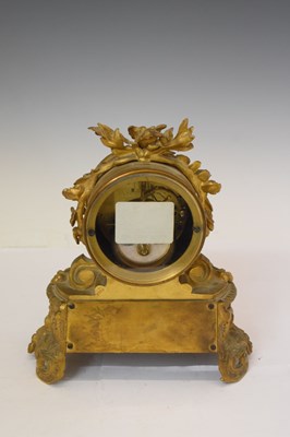 Lot 585 - French bronze and porcelain clock - Rollin