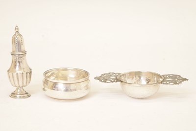 Lot 98 - George V silver tea strainer and bowl, and a Victorian pepperette