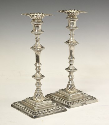 Lot 247 - Pair of late Victorian candlesticks