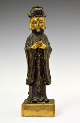 Lot 450 - Chinese parcel-gilt bronze figure of a sage or scholar