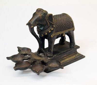 Lot 486 - South Indian bronze elephant form temple oil lamp