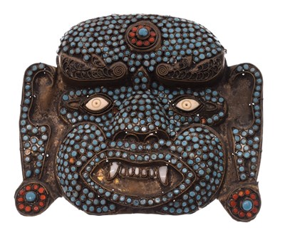 Lot 467 - Nepalese or Tibetan bead-mounted brass mask of Mahakala