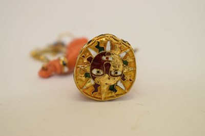 Lot 292 - Southern Italian carved coral and enamel figural pendant