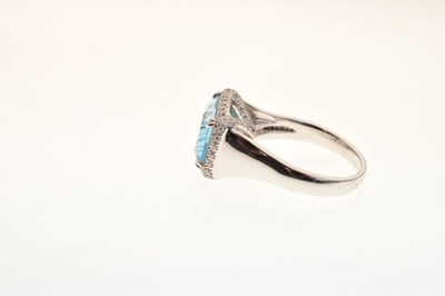 Lot 41 - 18ct white gold blue topaz and diamond dress ring