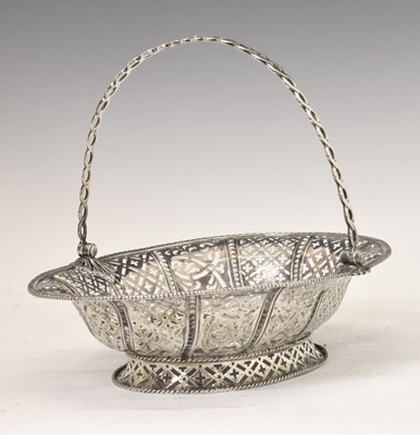 Lot 239 - George II silver oval basket