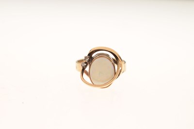Lot 54 - Modernist gold ring set opal cabochon and two small diamonds