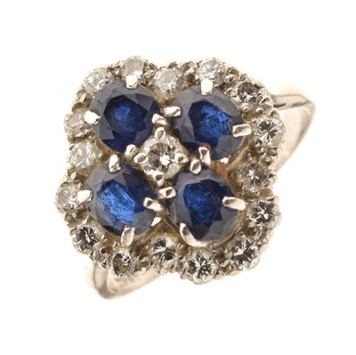 Lot 128 - Sapphire and diamond cluster ring