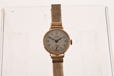 Lot 82 - Tissot - Lady's 9ct gold bracelet watch