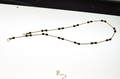 Lot 45 - Yellow metal bar and bead link necklace stamped '14K'