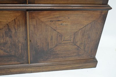 Lot 82 - Early to mid 19th century mahogany Estate-made bookcase on cabinet